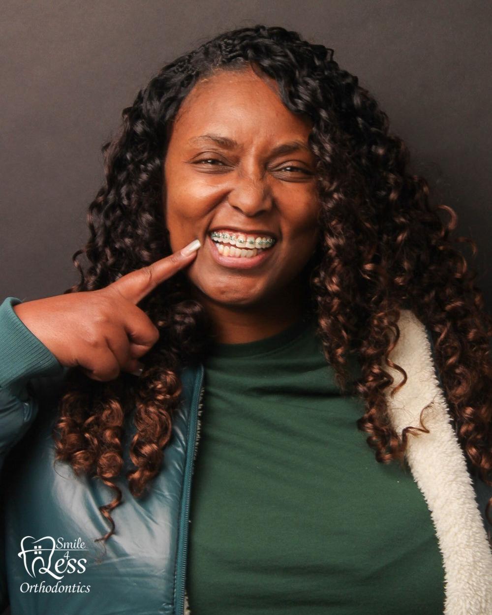 Patient laughing with a peace sign