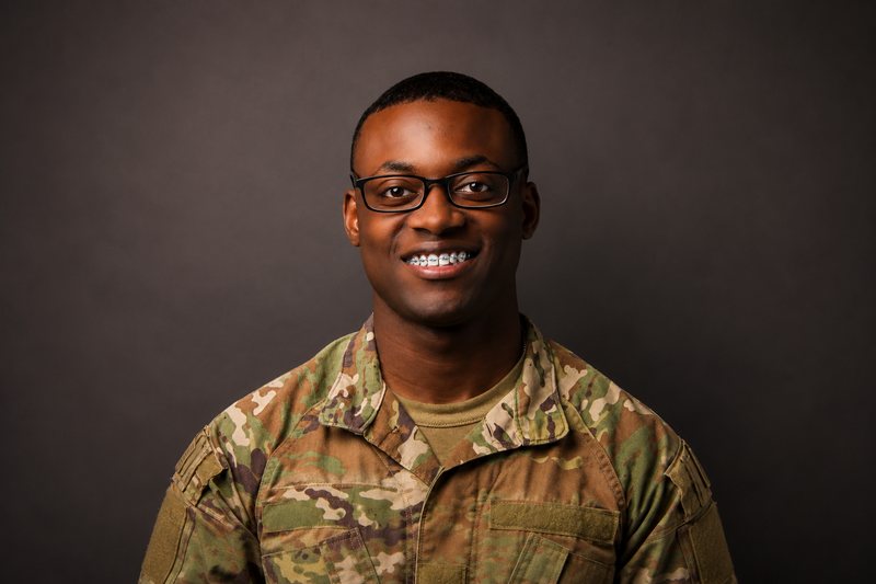 Adult smiling with braces