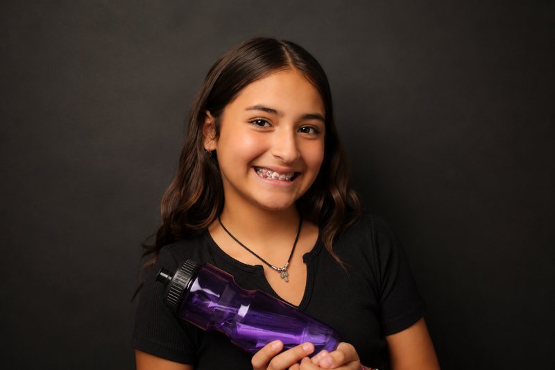 Child smiling with braces