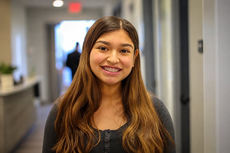 Teen smiling with braces